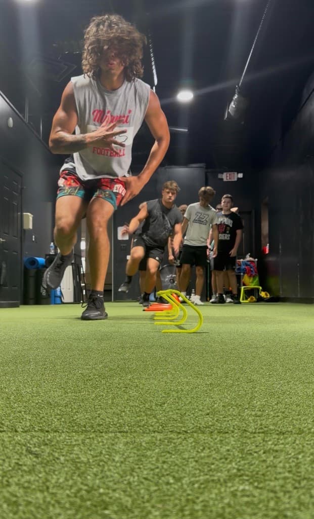 DAWG athletes training agility on the turf in Mooresville